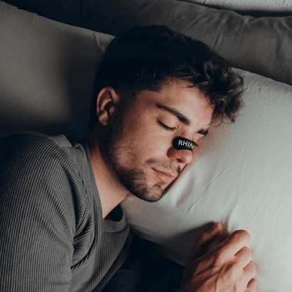 RhinoGear nasal strips while sleeping to help snoring as a sleep aid